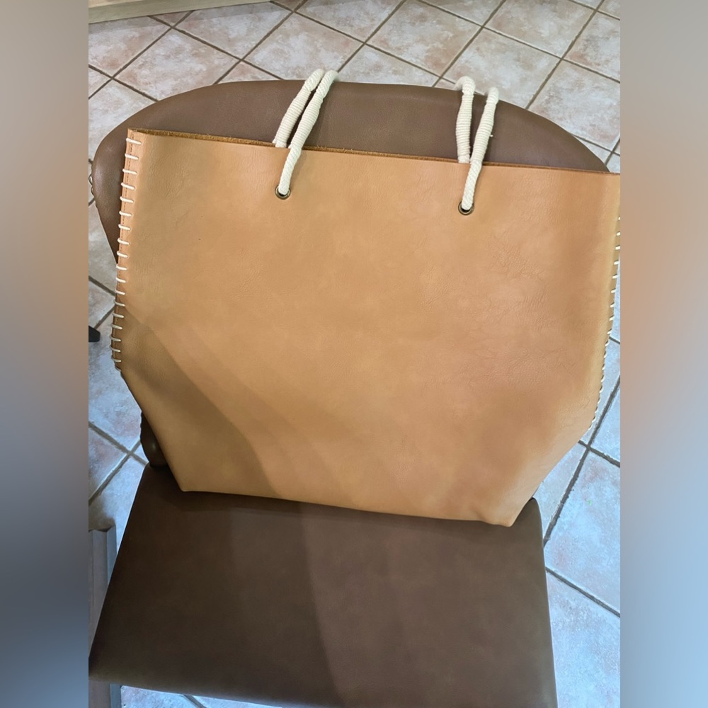 Leather look tote with side stitch detail